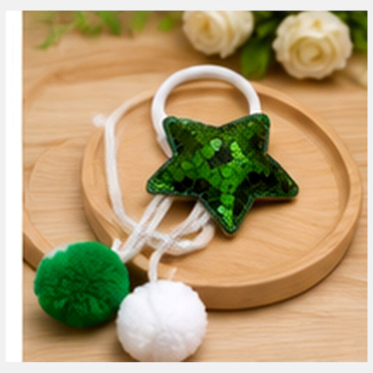 Pakistan star sequin hair pony displayed in a premium neutral gift-box setting