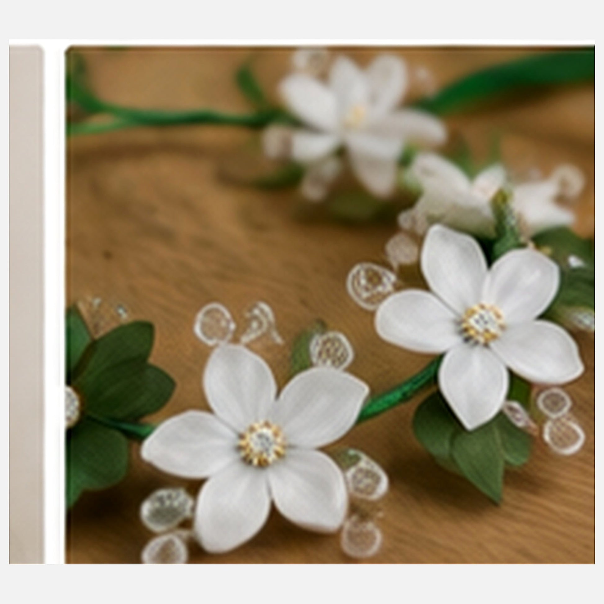 Macro close-up of green and white flowers, clear beads, wrapped band and ribbon finishing on the hair crown