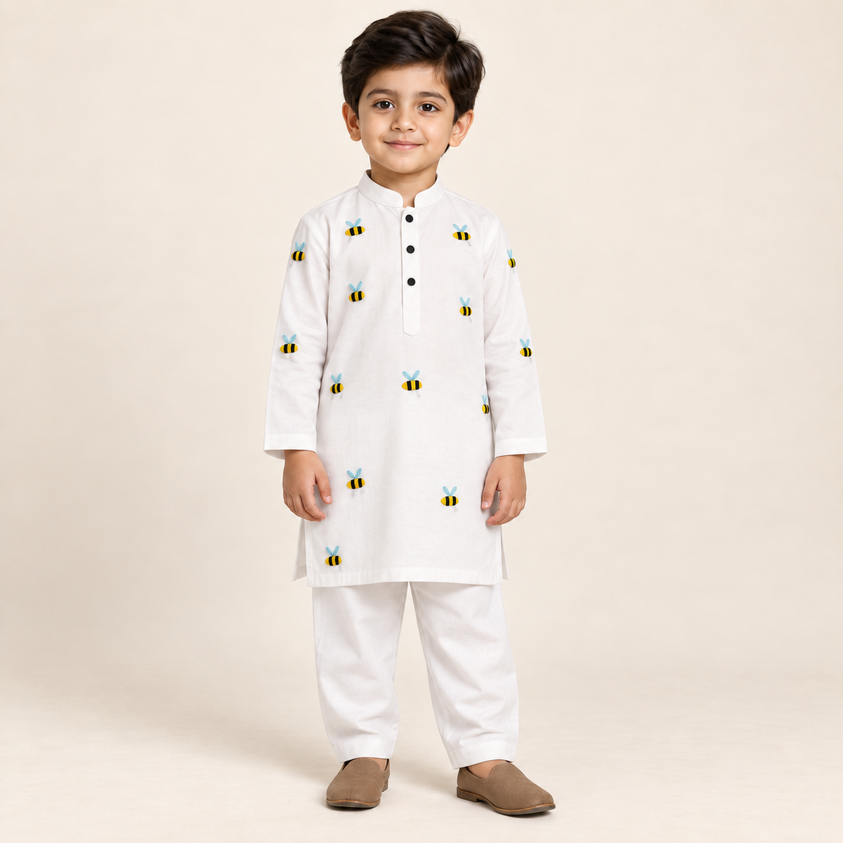 Boys Bee Embroidered White Kurta & Trouser Set worn by an ELADENS Kids model
