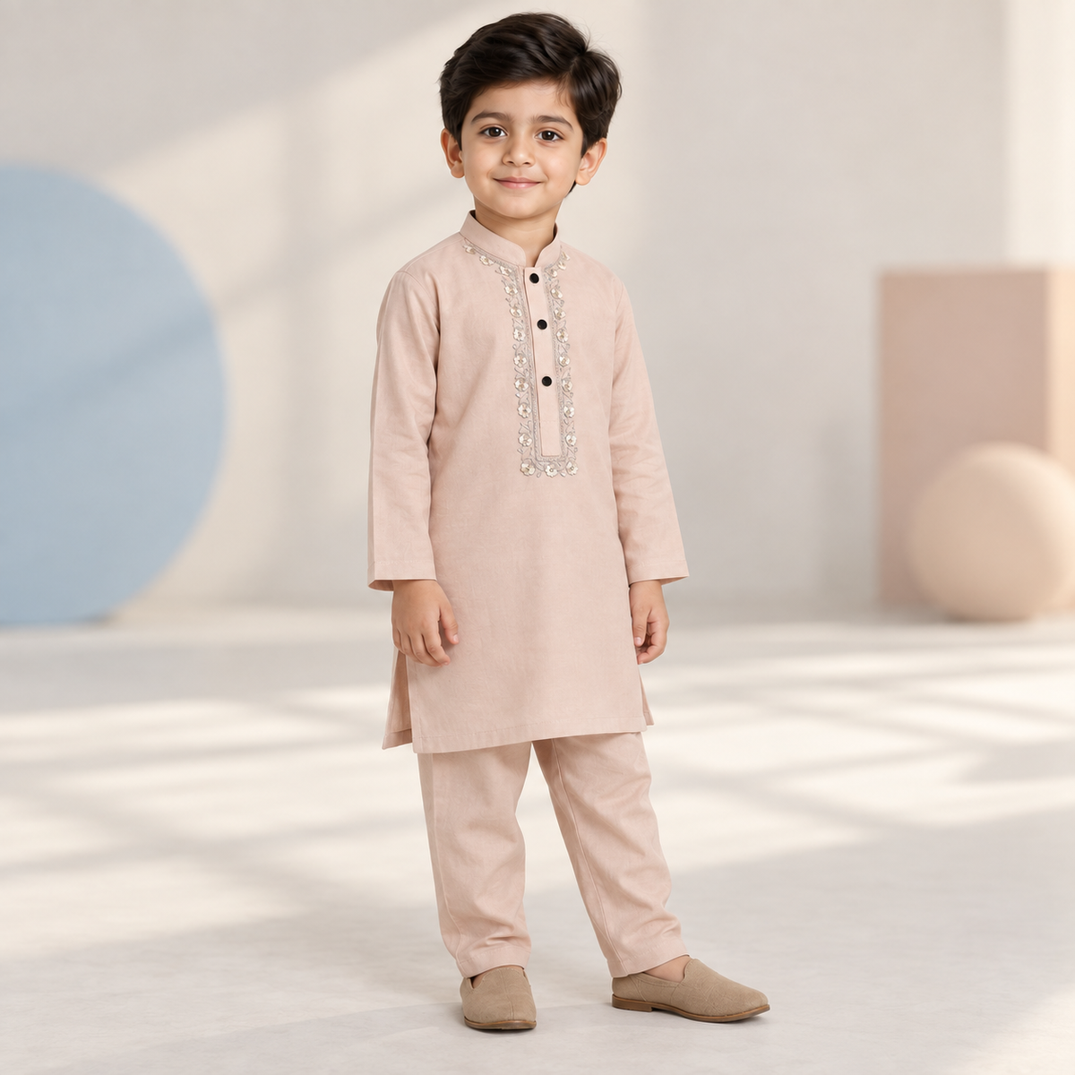 Boys Hand Embroidered Powder Pink Kurta & Trouser Set worn by an ELADENS Kids model