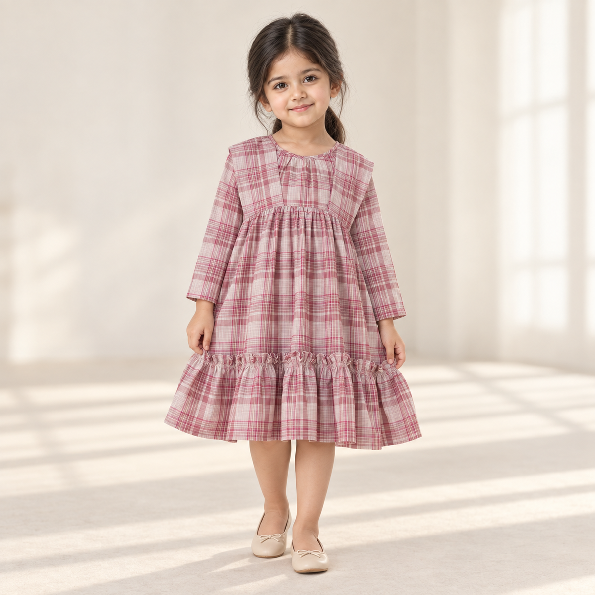 Girls Pink Check Dress worn by an ELADENS Kids model