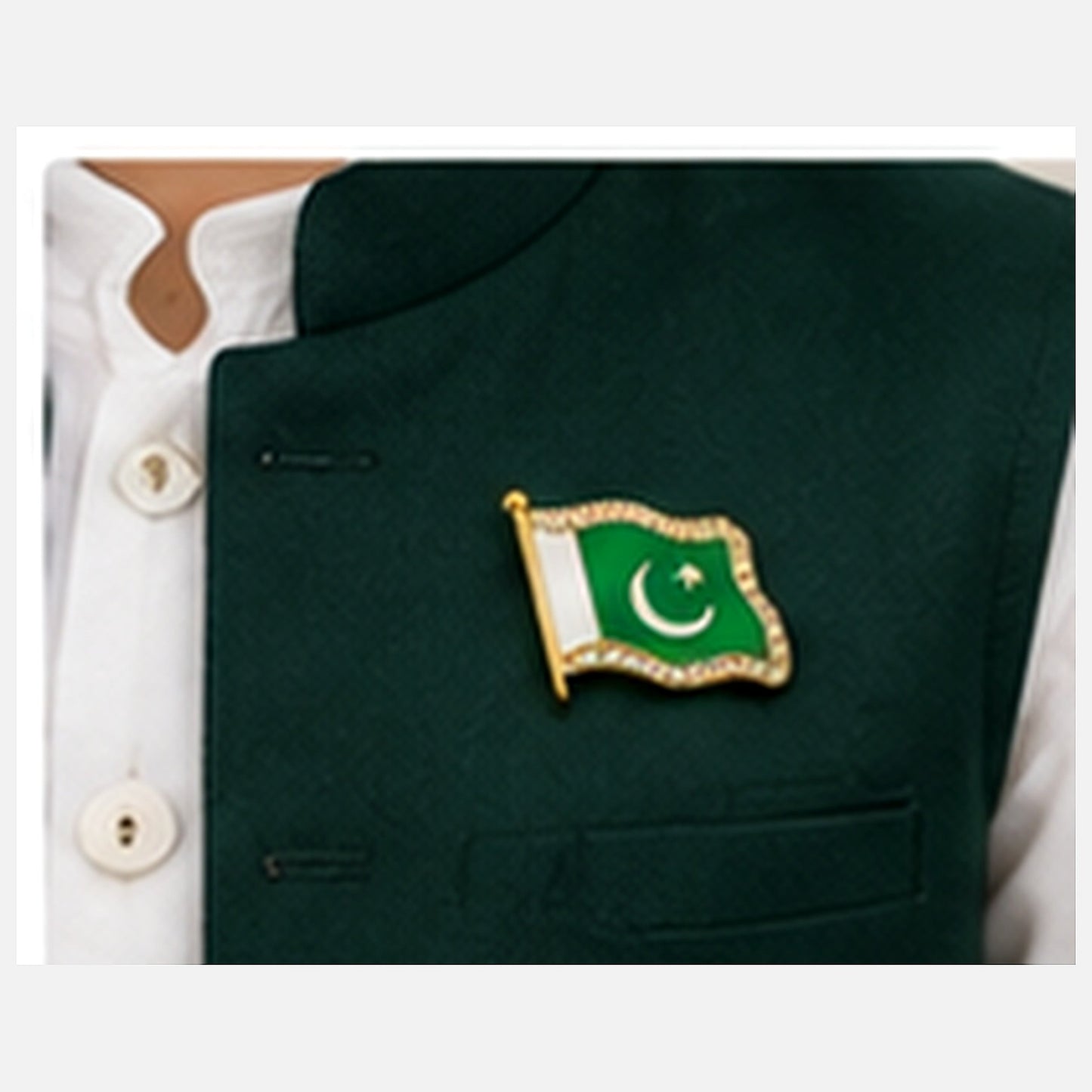 Fictional child wearing one single Pakistan flag metal badge on a green waistcoat